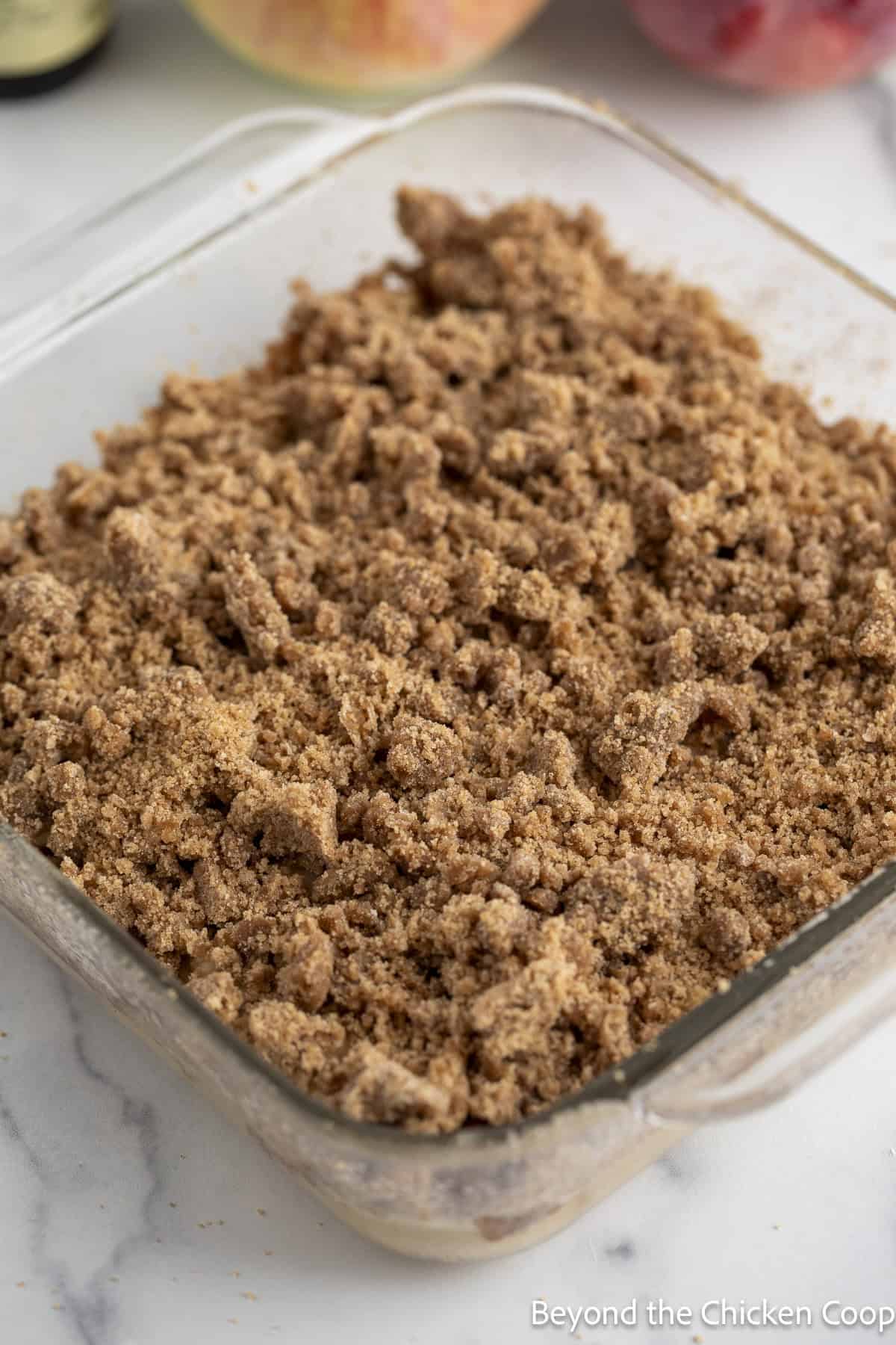 Crumble topping in a baking dish. 