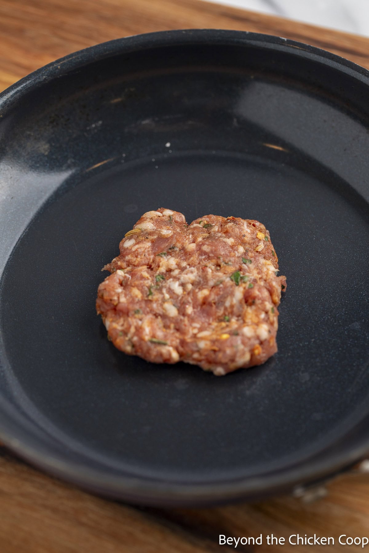 Cooking a sample patty of homemade sausage. 