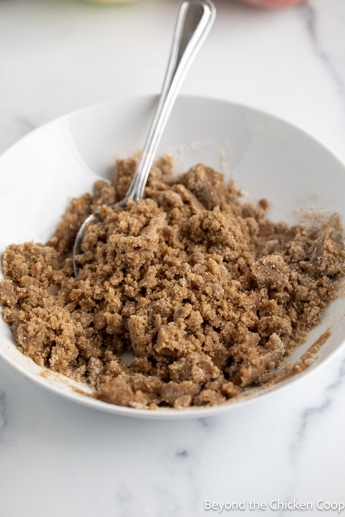 Streusel topping mixed in a white bowl. 