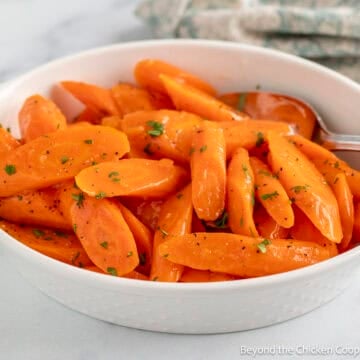 A dish filled with Maple Glazed Carrots.