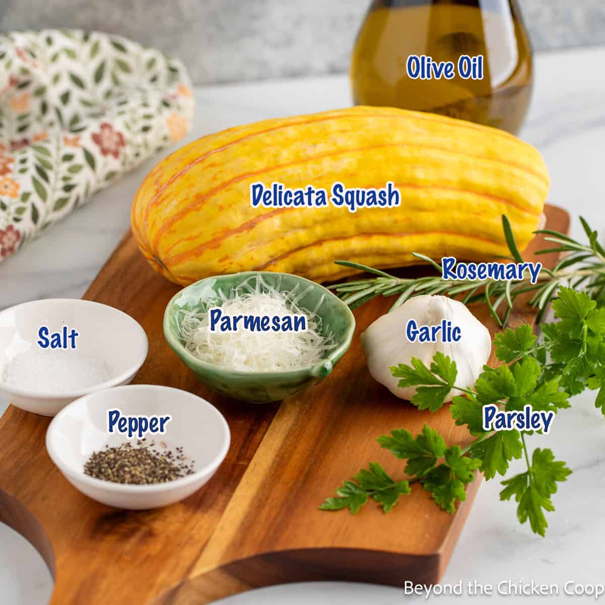 A yellow squash, fresh herbs, Parmesan cheese, salt, and pepper displayed on a wooden cutting board.