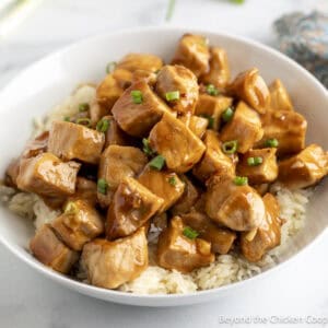 Honey Garlic Pork Bites on a bed of rice.