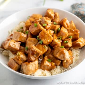 Honey Garlic Pork Bites on a bed of rice.