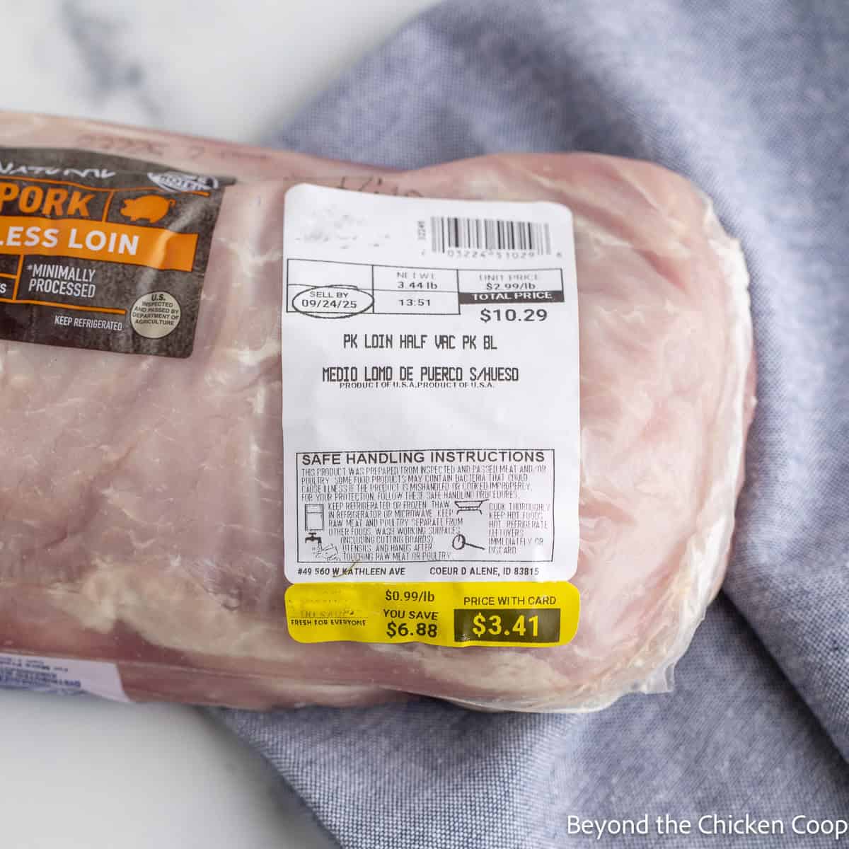 A price tag on a pork loin.