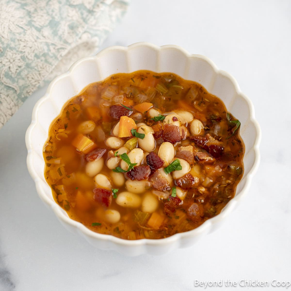 Bean with Bacon Soup in a white bowl.