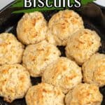 Baked biscuits in a black skillet.