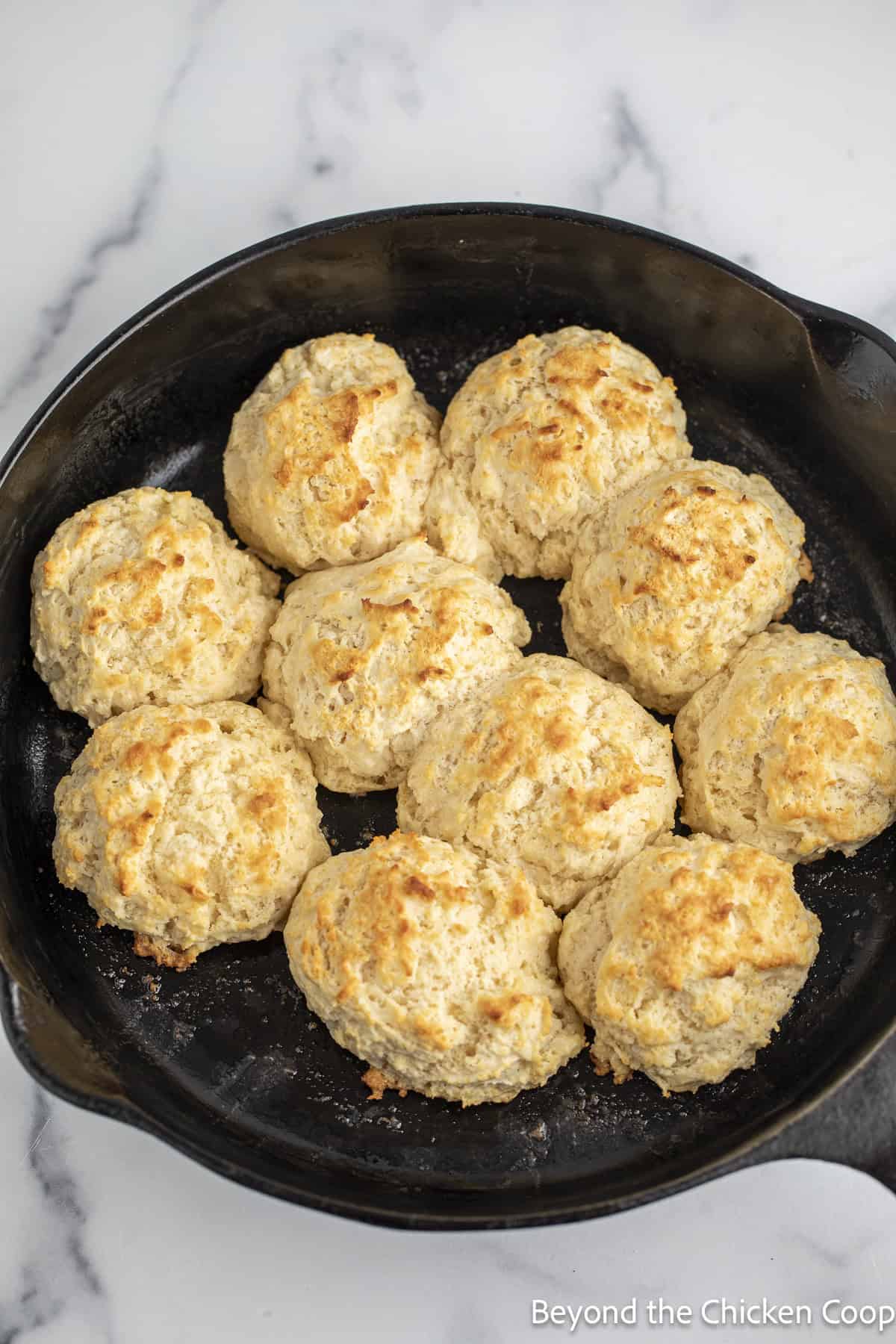 Baked biscuits in a skillet.