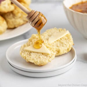Easy drop biscuits with butter and a honey drizzle.