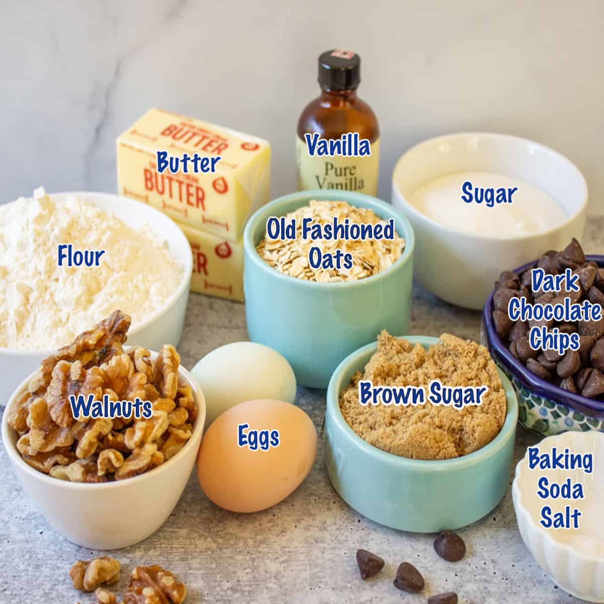 Small bowls filled with ingredients for making cookies.