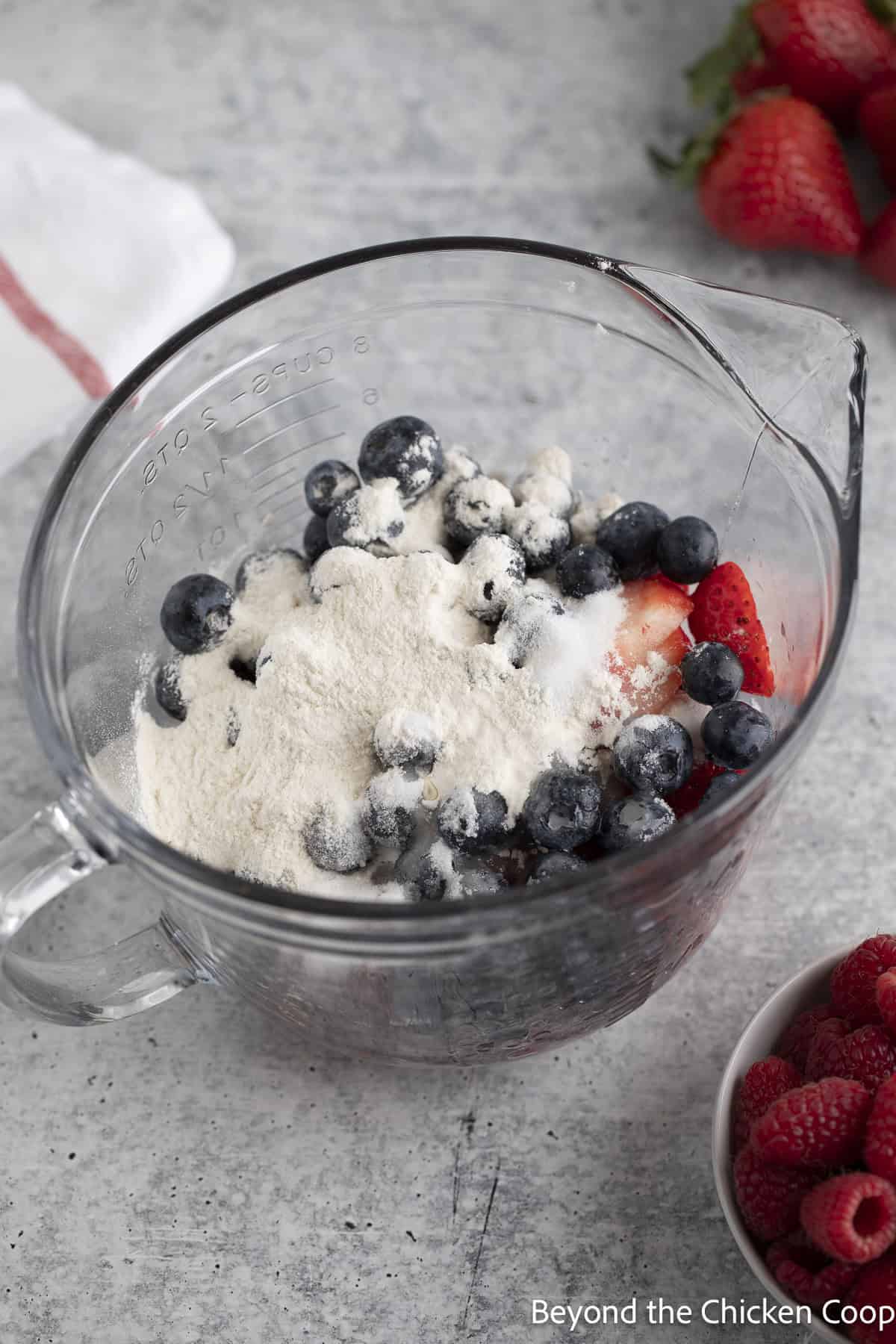 Berries topped with flour and sugar.