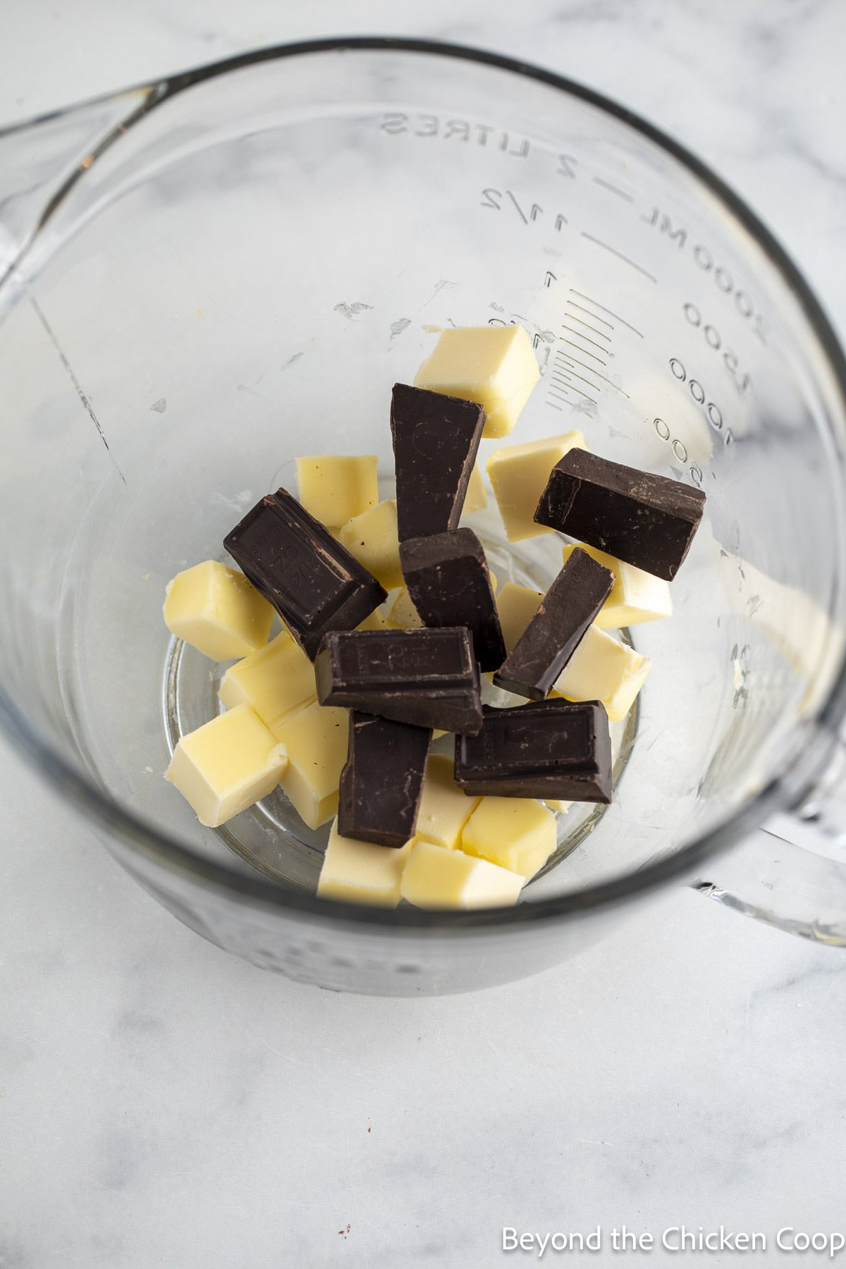 Chocolate and butter in a glass bowl.