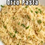 A white bowl filled with orzo pasta.