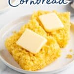 Sliced cornbread with pats of butter on top each slice.