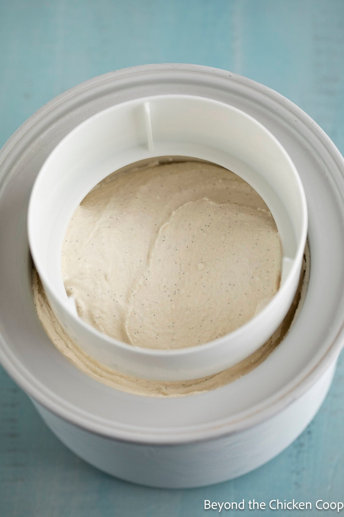 Churned ice cream in an ice cream machine.