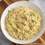 Creamy Orzo Pasta in a white bowl.