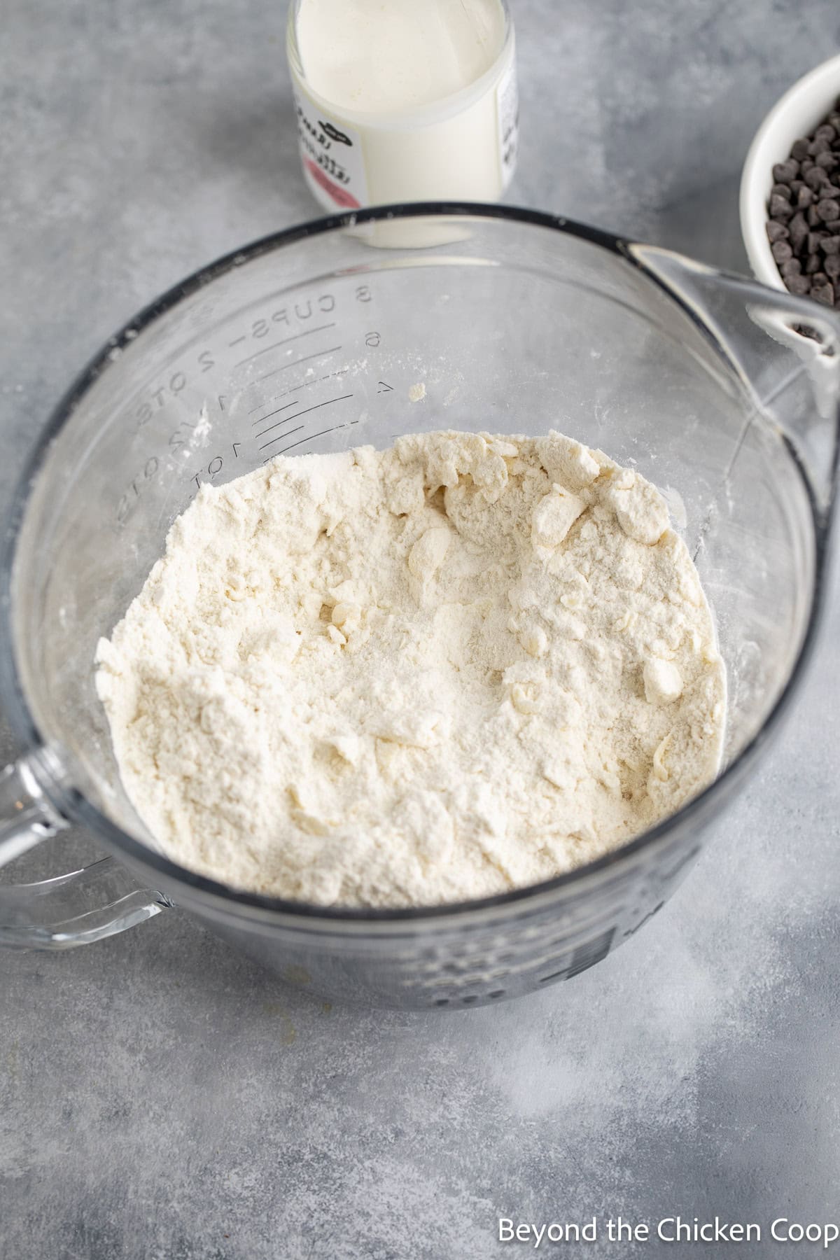 Flour in a glass bowl.