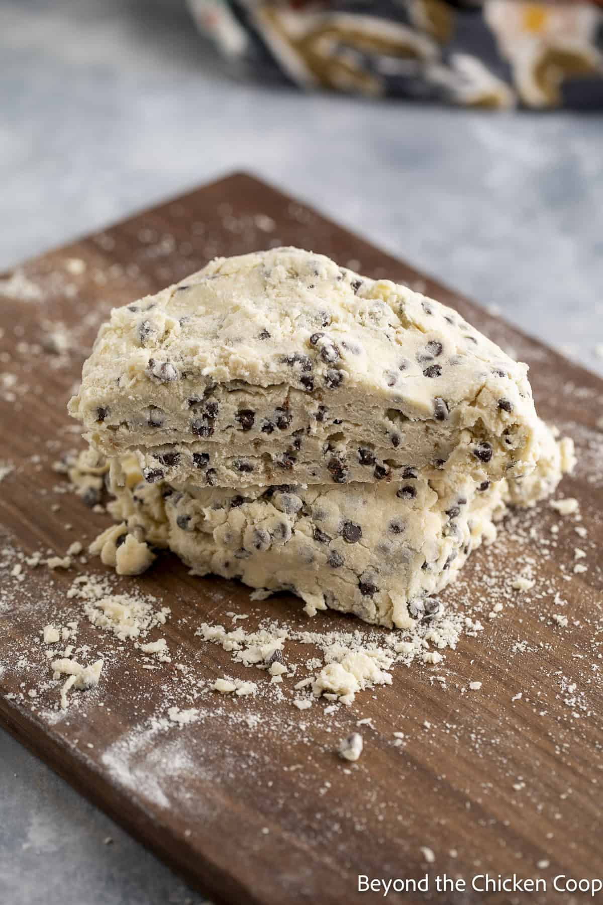 Scone dough on a wooden board.