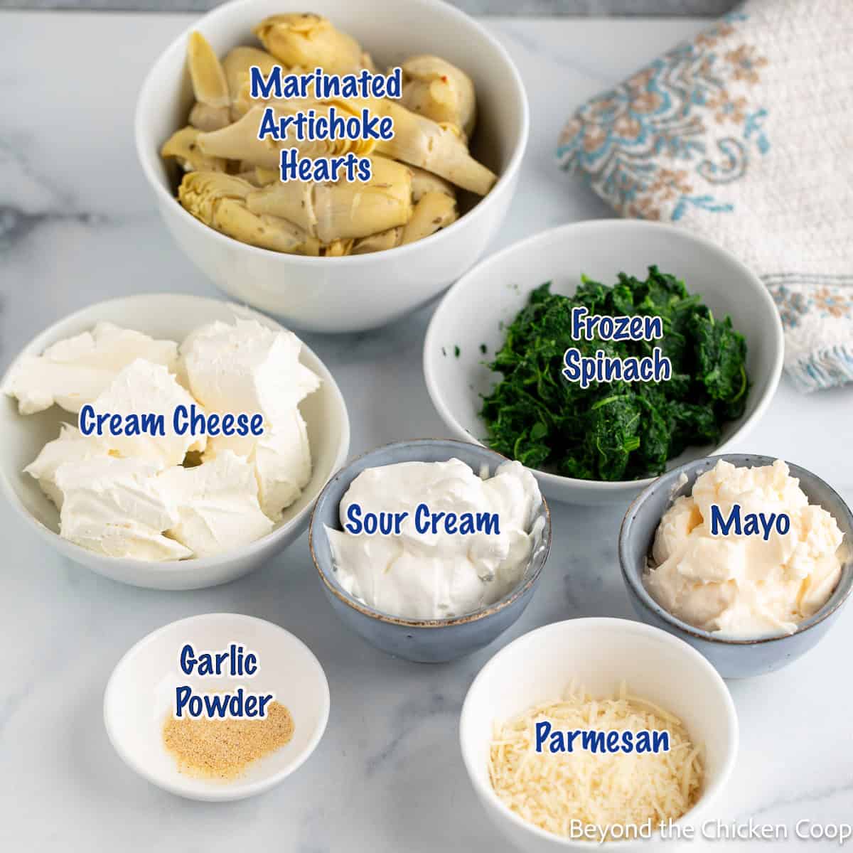 Ingredients for making an artichoke dip.