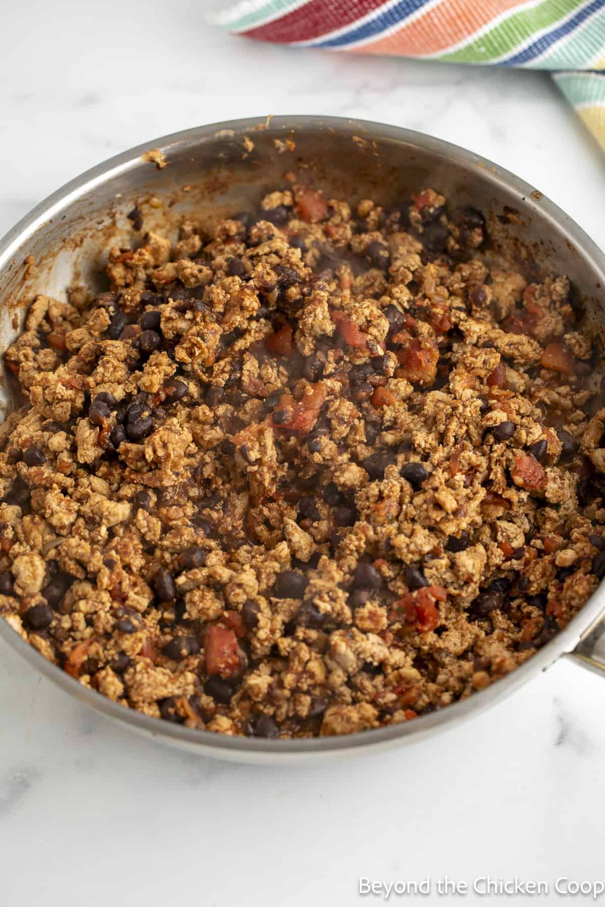 Turkey taco filling in a skillet.