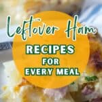 Scalloped potatoes with leftover ham on a plate.