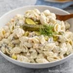 A bowl filled with Dill Pickle Pasta Salad.