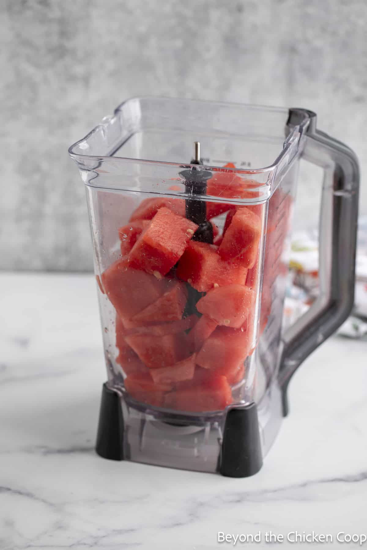 Watermelon chunks in a blender.