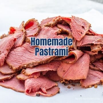 Slices of homemade venison pastrami on parchment papaer.