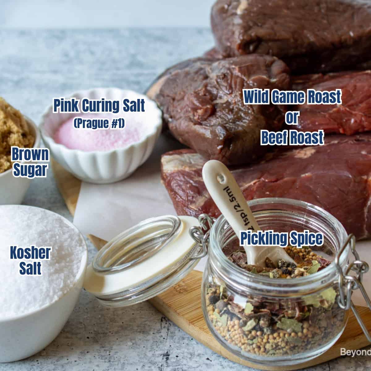 Roasts along with small bowls filled with sugar, salt and spices.