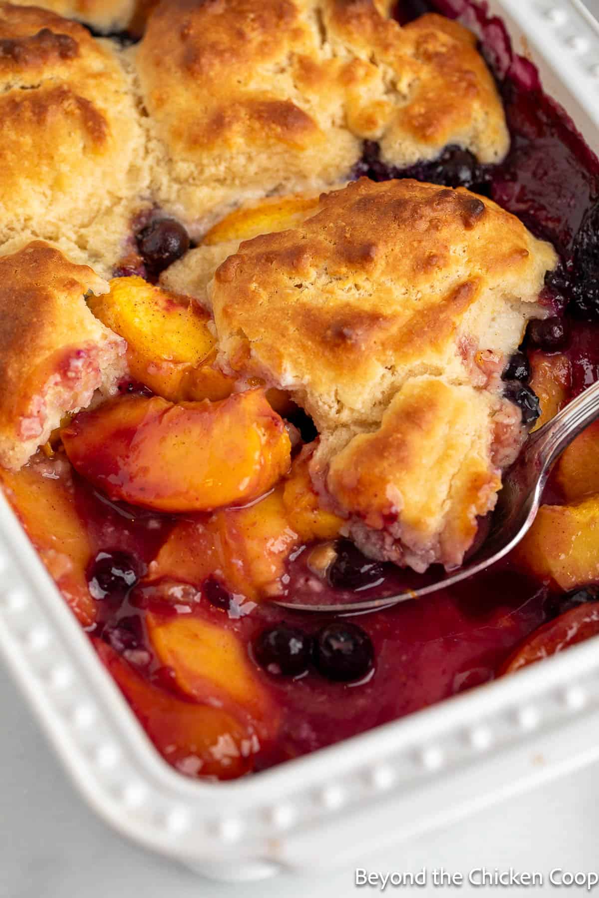 A spoon in a cobbler dish.