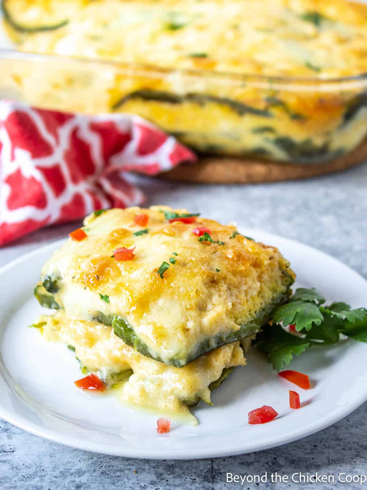 A layered egg casserole with chile peppers.