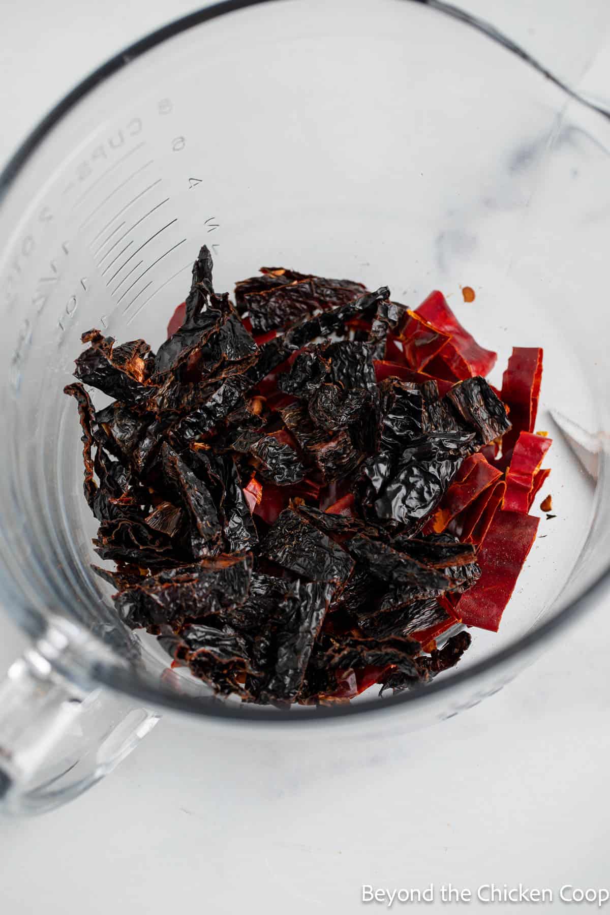 Soaking dried chiles in water.
