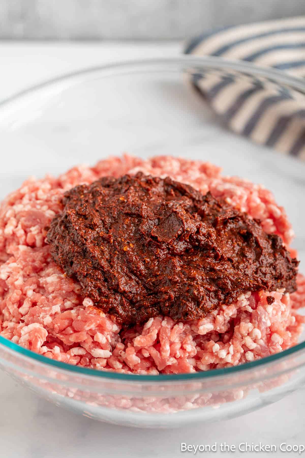 Ground pork with chile puree.